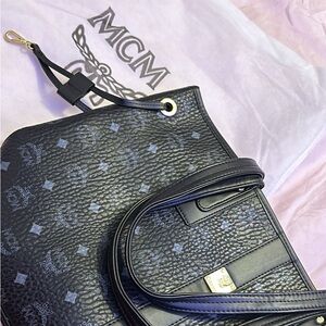 MCM tote bag brand new black on black. Never worn. Never used. Great condition.